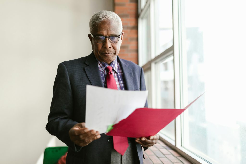 A 65 year old man reviewing a Medicare plan