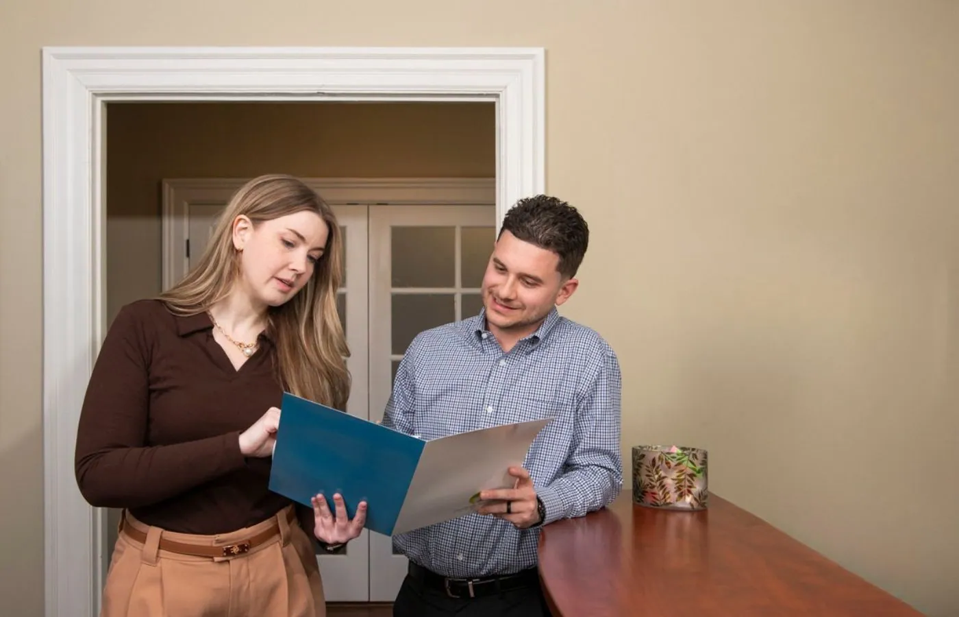 Advisor reviewing client coverage documents during an ICHRA consultation