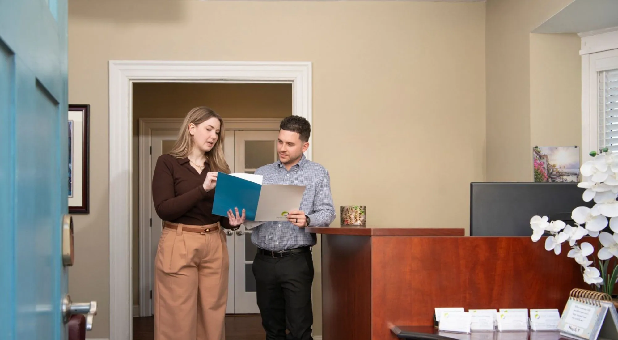 Advisor explaining health insurance options to a client