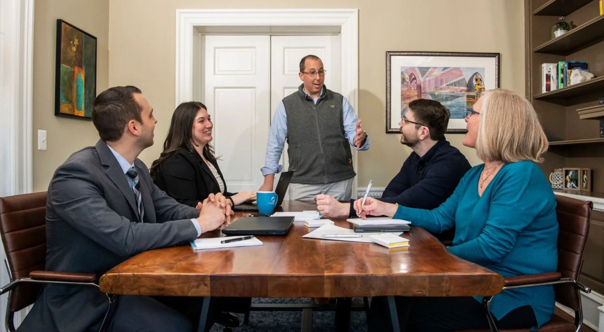 Small business owner meeting with an advisor to compare health insurance options in Pennsylvania