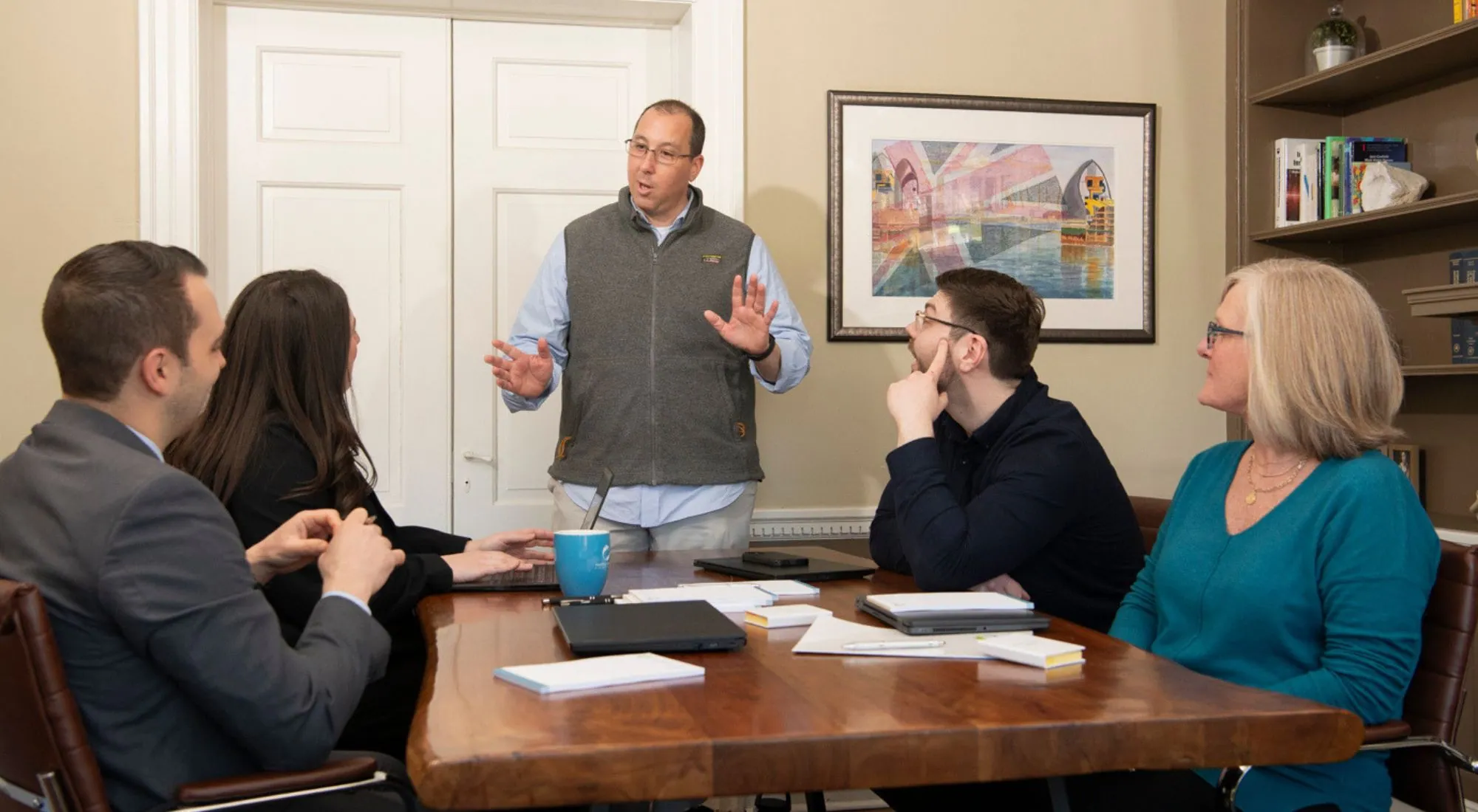 Advisor meeting with a business owner to discuss workers compensation and insurance planning