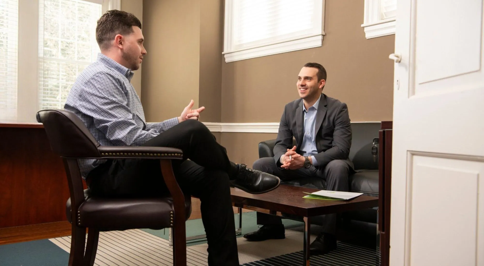 Health and Benefits Partners advisor meeting with a business client to discuss small group health insurance options