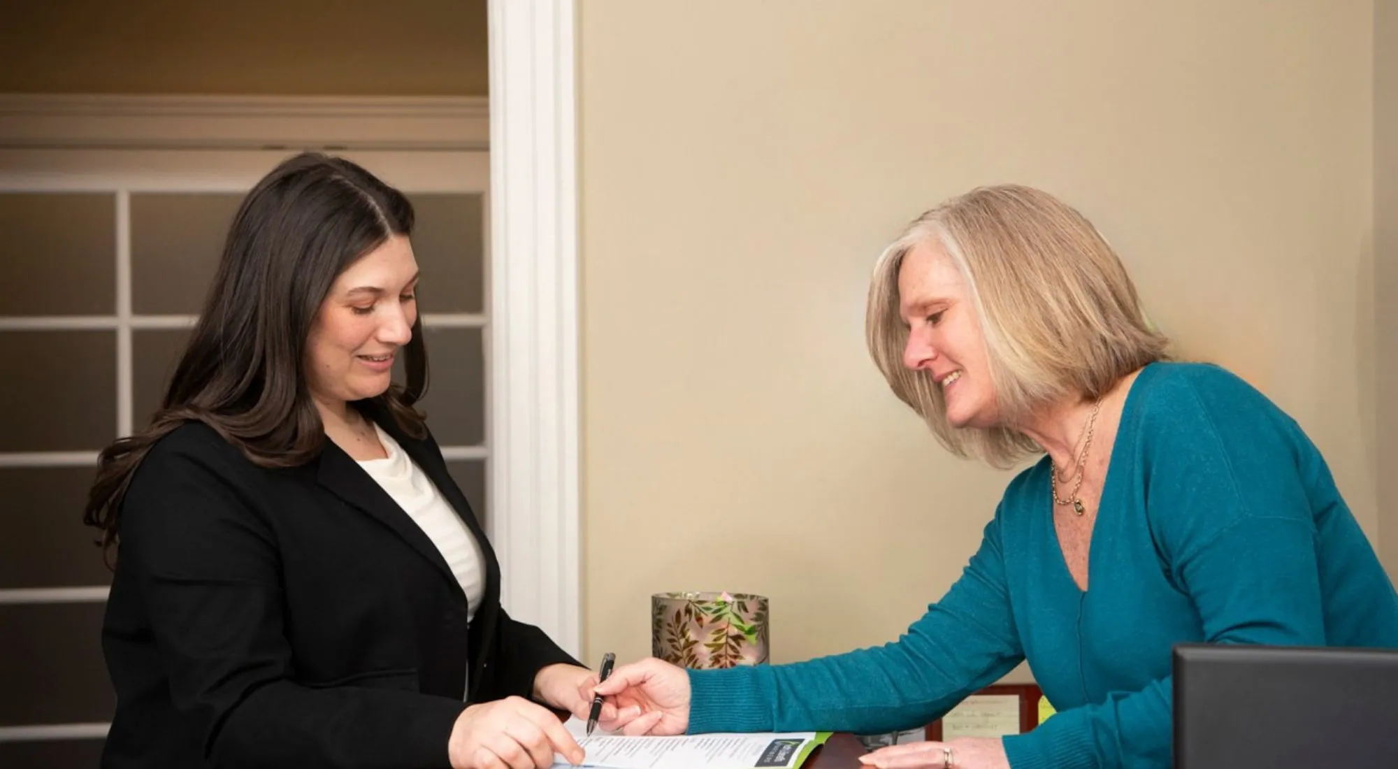 Advisors discussing small group health insurance options with clients